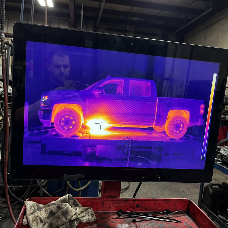 Thermal camera view of a Silverado on a dyno with the torque converter area glowing hot